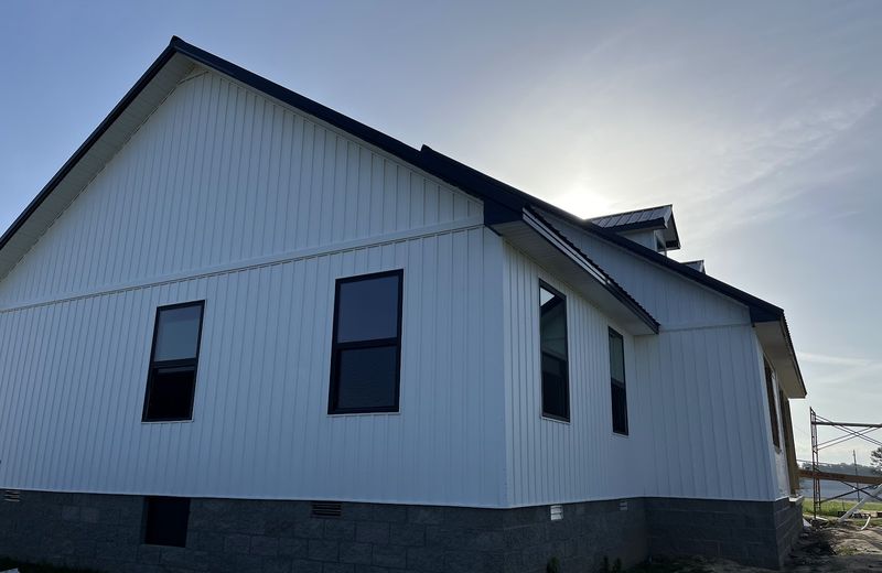 A finished home addition tied into an existing roofline